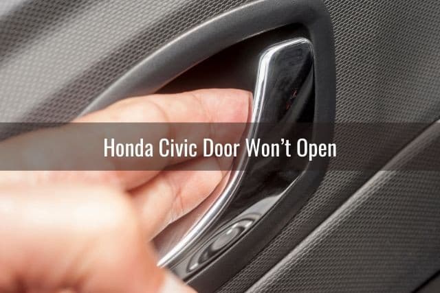 Fingers pulling on inside car door handle