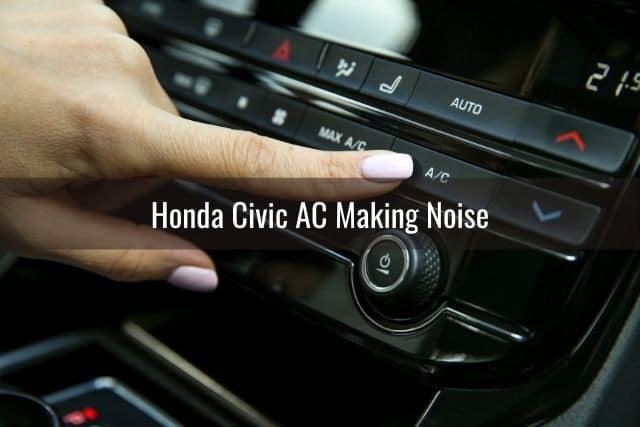 Female hand and finger pressing on car AC button
