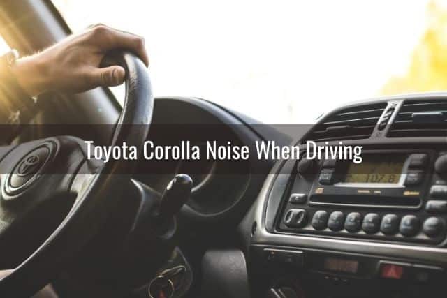 Side view of driver turning Toyota car steering wheel