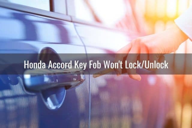 Hand putting car key to door to unlock