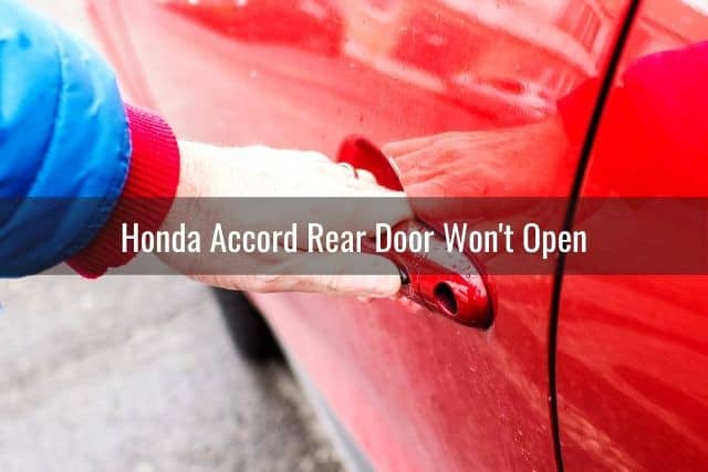 Hand pulling on outside car door handle