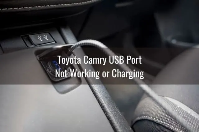 USB cable plugged in car port