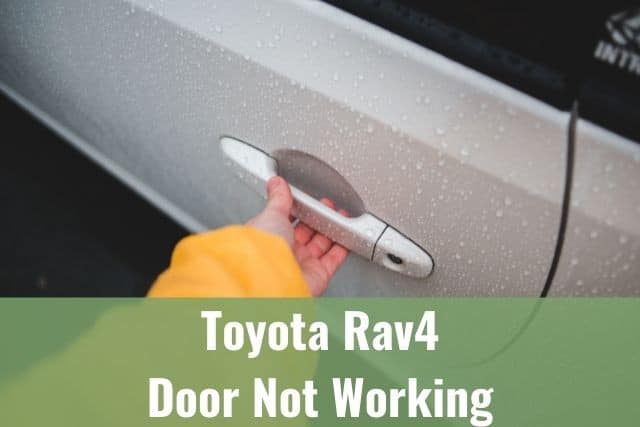 Hand opening white car door handle