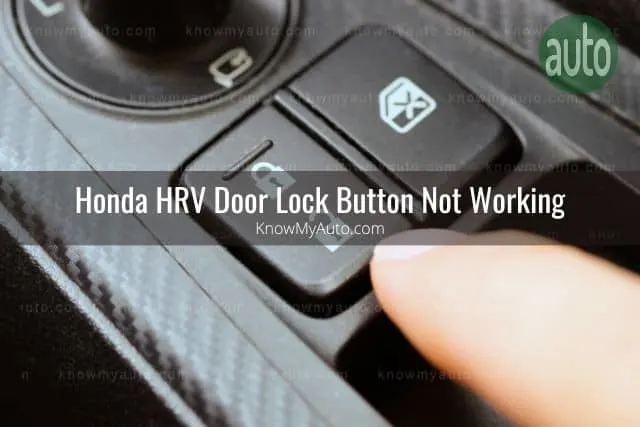 Finger pushing car door lock button