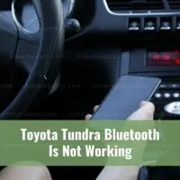 Person connecting phone to car Bluetooth