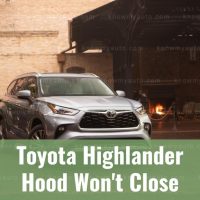 Toyota Highlander parked in front of hotel entrance