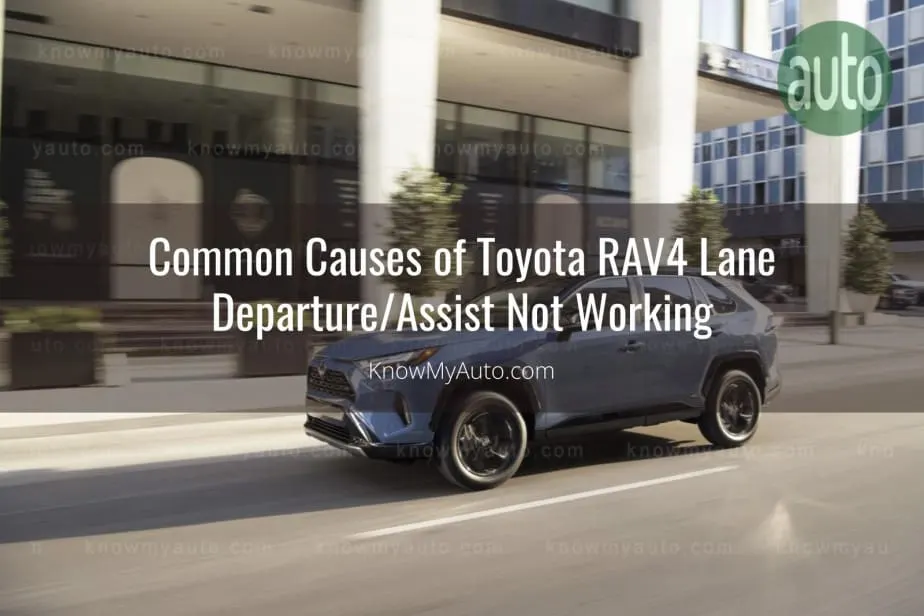 Toyota RAV4 parked outside white office building