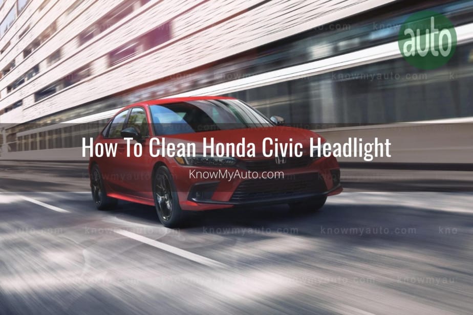 Red Honda Civic driving through downtown city